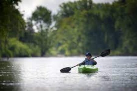 Kayaking Adventures: Navigating Betsie River with Shuttle Services